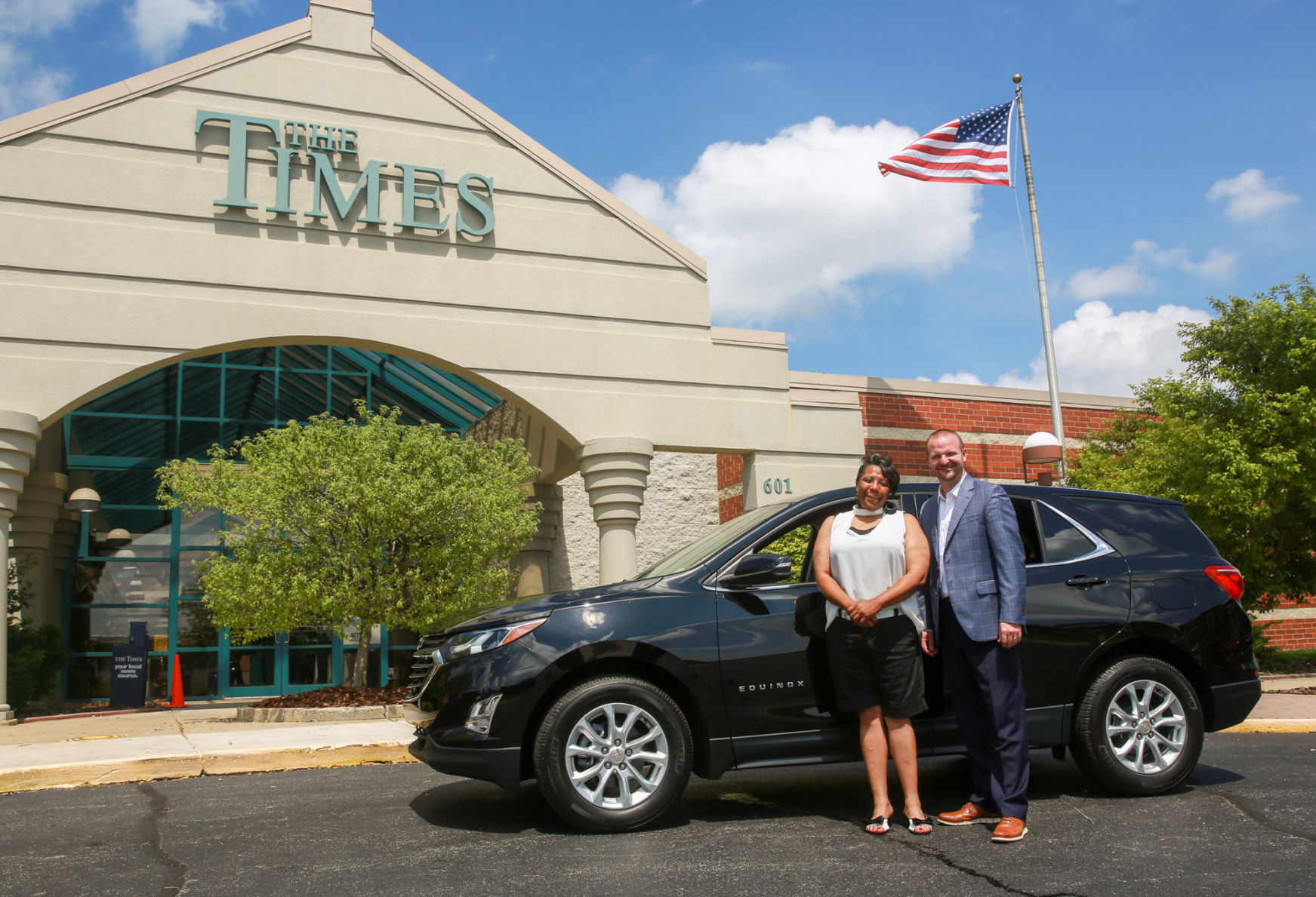 Presentation of new Chevy to Times/Chevy contest winner Lolita Whitehead
